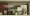 A bookshelf full of sci-fi books and Star Wars lego figures.